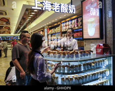 Los Angeles, California, USA. 4th Sep, 2016. A yogurt store in the Nanjing Road Pedestrian Street on September 5, 2016, in Shanghai, China. Nanjing Road is the main shopping street of Shanghai, China, and is one of the world's busiest shopping streets. The street is named after the city of Nanjing, capital of Jiangsu province neighbouring Shanghai. Today's Nanjing Road comprises two sections, Nanjing Road East and Nanjing Road West. In some contexts, ''Nanjing Road'' refers only to what was pre-1945 Nanjing Road, today's Nanjing Road East, which is largely pedestrianised. Before the adop Stock Photo