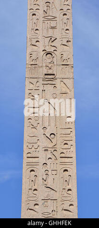 Hieroglyph script on ancient egyptian obelisk in the center of Piazza del Popolo square Stock Photo