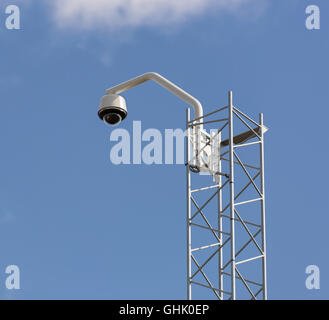 Video Surveillance Camera with a blue sky. Stock Photo