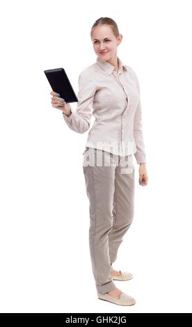 front view of standing young beautiful  girl with tablet compute Stock Photo