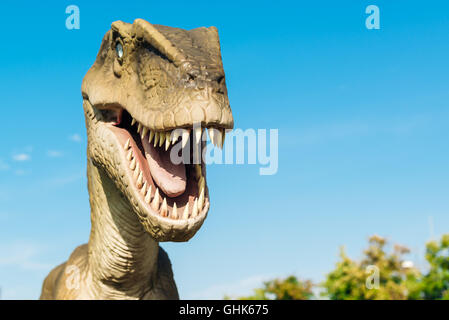 NOVI SAD, SERBIA - AUGUST 7, 2016: Velociraptor life size model of prehistoric animal in theme entertainment Dino Park. Stock Photo