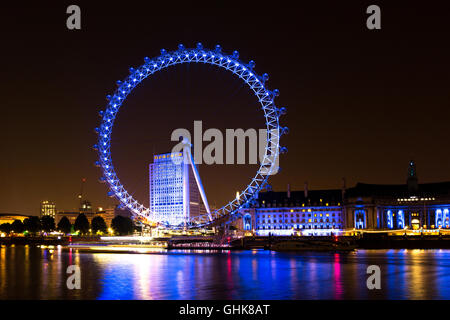 The London Eye on the South Bank of the River Thames at night. At a height of 135 meters, London Eye is the tallest Ferris wheel Stock Photo