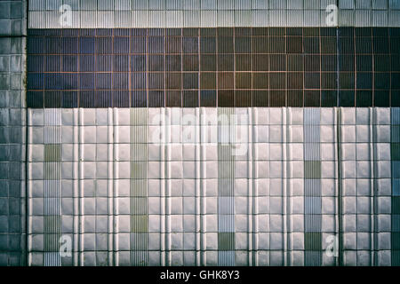 Vintage toned old ceramic tile wall, abstract background. Stock Photo