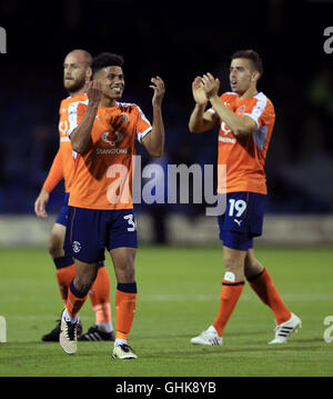 Luton Town's James Justin (left) celebrates victory after the EFL Cup, First Round match at Kenilworth Road, Luton. Stock Photo