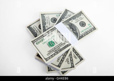 Cutout of a pile of US bank notes on white background Stock Photo