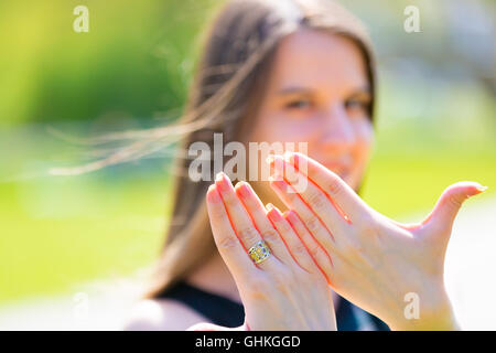 Girl shows hands with nail design Stock Photo