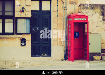 Brithish Telephone Cabin in the old Town of Valletta on Malta in Europe. Stock Photo