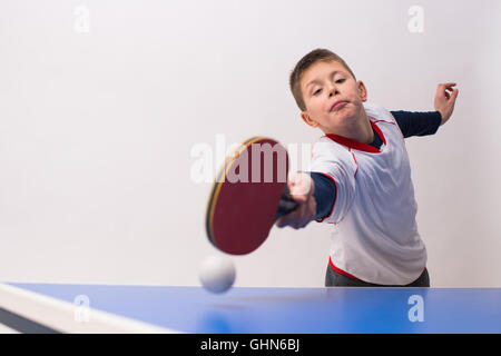 little boy playing table tennis Stock Photo