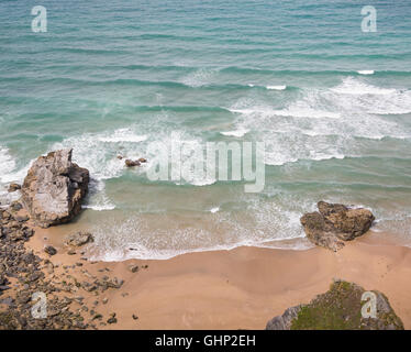 Looking down on the sea and the beach from the clifftops of Cornwall Stock Photo
