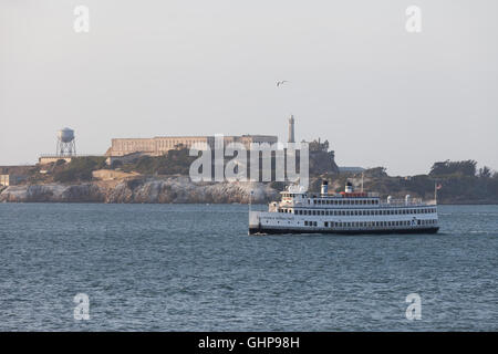 San Francisco, California: The California Hornblower passing Alcatraz Island in the Golden Gate National Recreation Area. Stock Photo