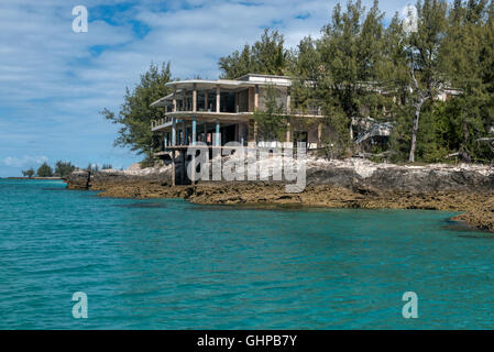 The derelict art deco hotel on Sanata Carolina Island in The Bazaruto Archipelago off Mozambique seen from the sea. Stock Photo