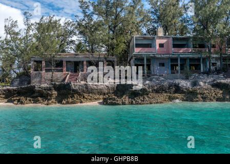 The derelict art deco hotel on Sanata Carolina Island in The Bazaruto Archipelago off Mozambique seen from the sea. Stock Photo