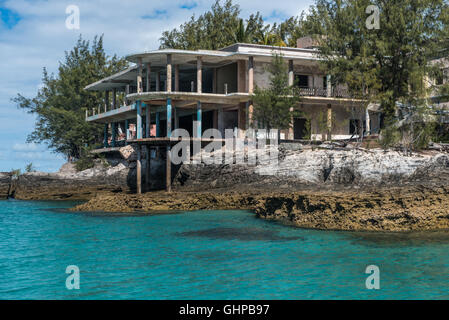 The derelict art deco hotel on Sanata Carolina Island in The Bazaruto Archipelago off Mozambique seen from the sea. Stock Photo