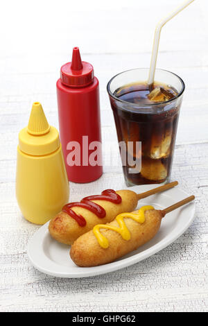 homemade corn dogs and cola Stock Photo