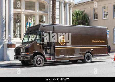 A UPS truck makes a local delivery in Charleston, South Carolina. Stock Photo
