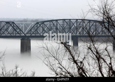 Mississippi River Bridge in fog Stock Photo