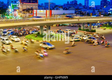 Circulation by vehicle at Hang Xanh intersection flyover, Saigon, Vietnam. Ho Chi Minh city (aka Saigon) is the largest city and economic center in VN Stock Photo