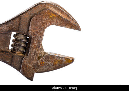 Close up of an old rusty adjustable wrench on a white back ground Stock Photo