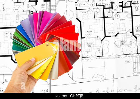 Rainbow color palette and construction plan in background Stock Photo