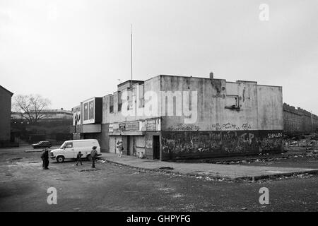 A graffiti covered Convenience Store and Public House in Ruchill, Glasgow, 1991. Stock Photo