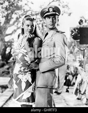 AUF EINER INSEL MIT DIR- Regisseur George Blaine dreht auf Hawaii einen Film mit Rosalind Reynolds (ESTHER WILLIAMS), Ricardo Montez (RICARDI MONTALBAN) und Yvonne Torro. Der geplagte Regieassistent Buckley hat als technischen Berater Lieutenant Kingslee von den amerikanischen Marinefliegern engagiert, ohne zu ahnen, daß Rosalind Reynolds für Kingslee die Traumfrau ist, seit er sie vor drei Jahren bei einer Tournee im Rahmen der US-Truppenbetreuung zum erstenmal sah. Um zu demonstrieren, wozu ein verliebter Lieutenant fähig ist, entführt er Miss Reynolds mitten aus den Aufnahmen mit Flugzeug Stock Photo