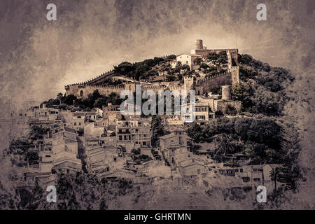 Capdepera castle on green hill in Mallorca Stock Photo