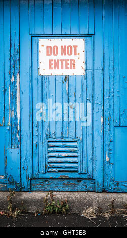 Rustic Blue Door WIth Do Not Enter Sign Stock Photo