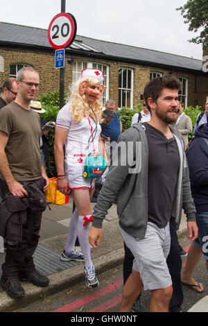 Vauxhall London UK. 11th August 2016. A Cricket fan dressed as a nurse arrives for the fourth test match between England and Pakistan at the Kia Oval in Vauxhall Credit:  amer ghazzal/Alamy Live News Stock Photo