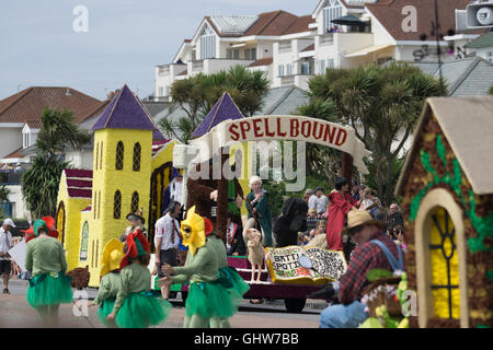 Jersey, Channel Islands, UK. 11th August, 2016. A participant float and contingent along the parade route of the Jersey Battle of Flowers 2016 Credit:  imagegallery2/Alamy Live News Stock Photo