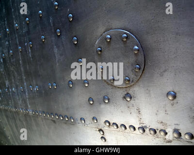 rivets on vintage aircraft fuselage Stock Photo