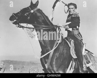 DIE ATTACKE DER LEICHTEN BRIGADE- Kalkutta 1854. Der englische Major Geoffrey Vickers (ERROL FLYNN) kehrt von einer Mission zurück und muß erfahren, daß sich seine Verlobte Elsa seinem Bruder Perry zugewandt hat. Zu spät durch-schaut Geoffrey auch eine List des abtrünnigen Stammesführers Surat Khan, die zu einem Massaker in der Garnisonsstadt Chukoti führt. Geoffreys Brigade folgt dem geflüchteten Khan bis zur Front des Krimkrieges. Eigenmächtig befiehlt er den Angriff auf Khan und treibt seine Truppe in eine aussichtslose Schlacht... Regie: Michael Curtiz aka. The charge of the light brigade Stock Photo