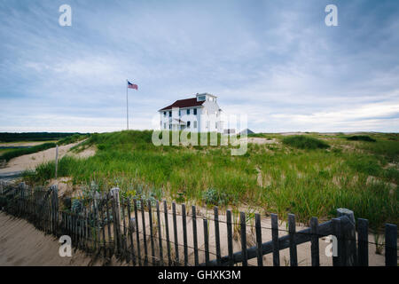 Fence and house at  Race Point, in the Province Lands at Cape Cod National Seashore, Massachusetts. Stock Photo