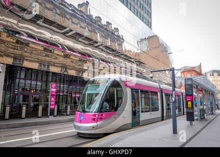 A Tram stopped at the station in  birmingham  UK Stock Photo