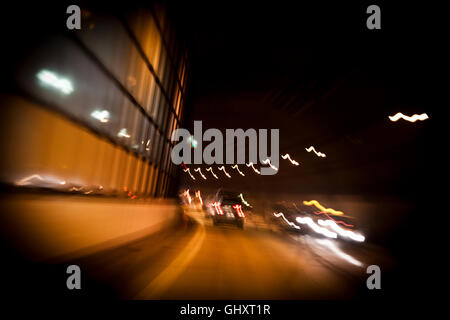 The blurred lights of traffic passing through a tunnel outside Kanazawa, Japan. Stock Photo