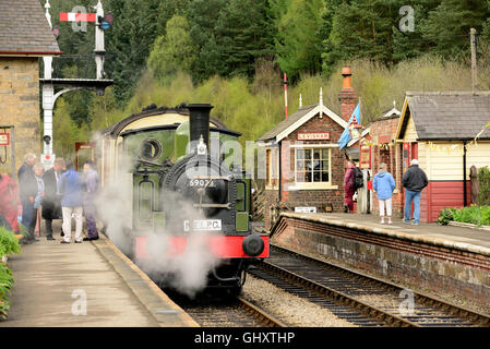 Class J72 0-6-0 tank locomotive No 69023 with observation coach, at Levisham station on the North Yorkshire Moors Railway. Stock Photo