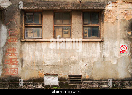 old writings on factory building in Guangzhou china Stock Photo