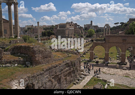 General view east over the Roman Forum area from the Tempio di Saturno (Temple of Saturn), columns on left, Rome, Italy. Stock Photo