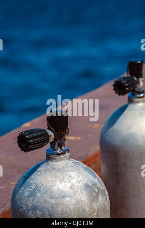 Two aluminum Compressed Air Tanks on Scuba Diving Boat Stock Photo