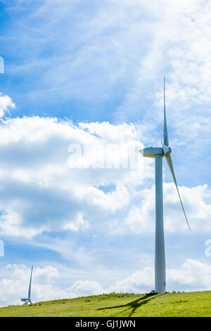 Wind turbine against a blue sky with clouds. Bilsthorpe and Eakring area, Nottinghamshire, England, UK Stock Photo