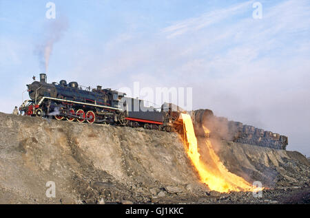 An industrial SY Class Mikado 2-8-2 on slag-tipping duties at Anshan, the iron and steel capital of China, September 1985. Stock Photo