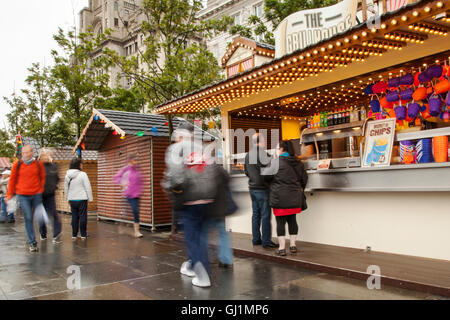 Fast food outlet selling chips at £4 a bucket on the Pier Head and Waterfront, in front of the Three Graces in Liverpool, Merseyside, UK Stock Photo