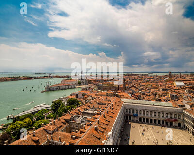 Aerial view of of St Mark's square, with St Mark's Basin and the Dogana da Mar in the distance. Stock Photo