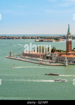 San Giorgio Maggiore harbour and church bell tower. Venice, Italy. Stock Photo