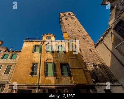 Traditional venetian rendered building. with window shutters and venetian blinds. Venice, Italy. Stock Photo