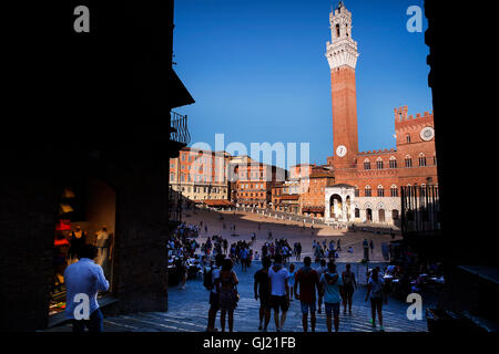 Piazza del Campo and the Torre del Mangia in Siena, Italy. Stock Photo