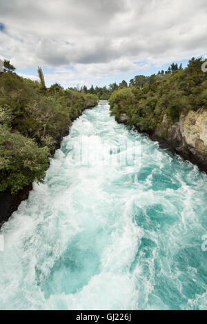 Side view of the rushing wild stream of Huka Falls near Lake Taupo, New Zealand Stock Photo