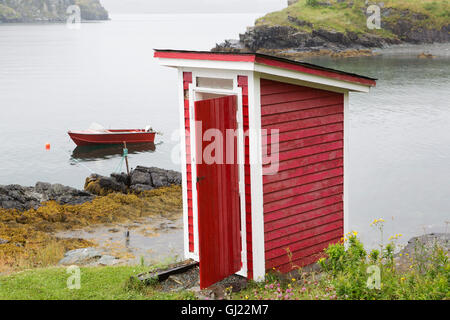 A red outhouse at Bay Roberts in Newfoundland and Labrador, Canada. Stock Photo