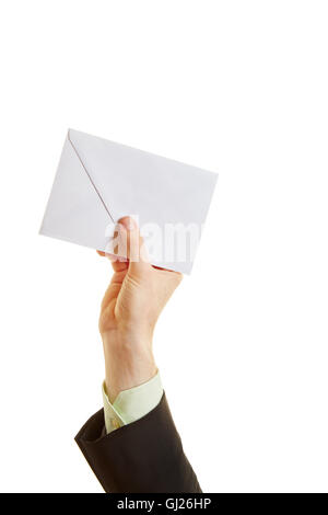 Hand holding an envelope in the air Stock Photo