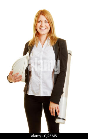 Engineer or architect holding her helmet and posing on a white background and smiling Stock Photo