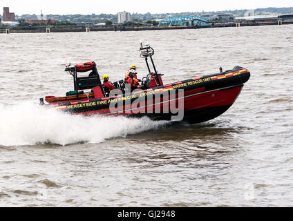 Merseyside Fire and Rescue Service boat on the River Mersey Stock Photo